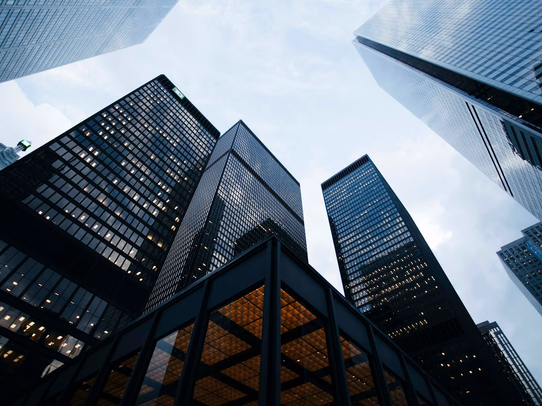 Modern commercial real estate buildings viewed from below